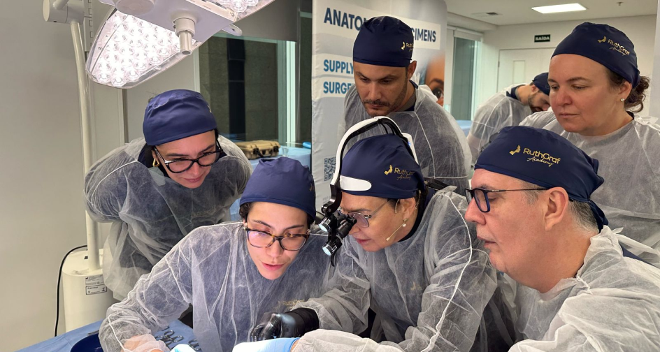 Participants and faculty during a cadaver lab session